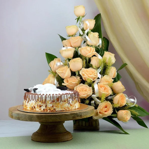 White Roses in vase And Butter scotch cake
