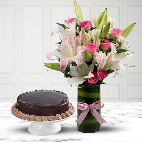 Blooming Lily Flowers and Chocolate Cake